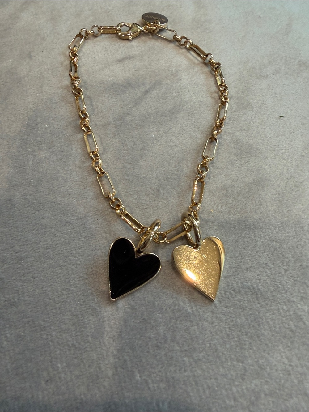 Gold Link Bracelet with Black Enamel and Gold Heart Charms by